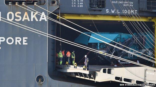 A piece of machinery is seen through rear door of the Hoegh Osaka cargo ship