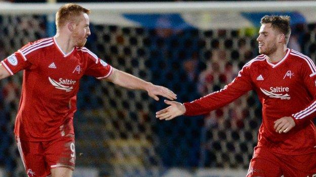 Adam Rooney (left) equalised