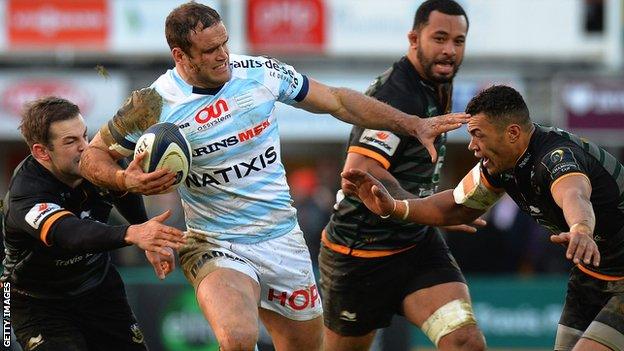 Racing's Wales centre Jamie Roberts takes on Stephen Myler (left) and Luther Burrell