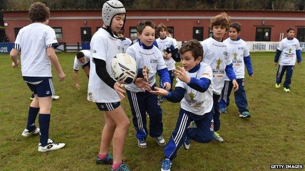 Children playing rugby