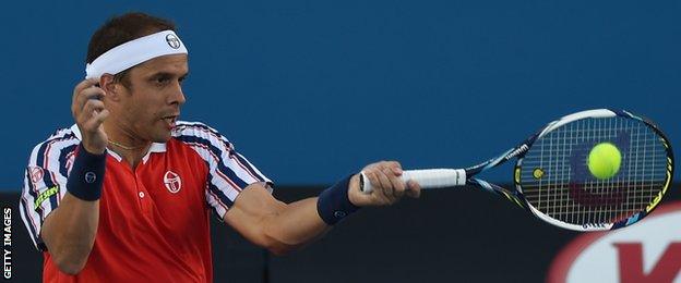 Gilles Muller in action at the Australian Open