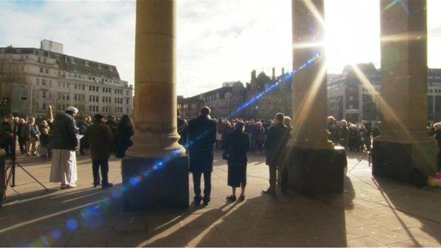 A crowd outside the council house