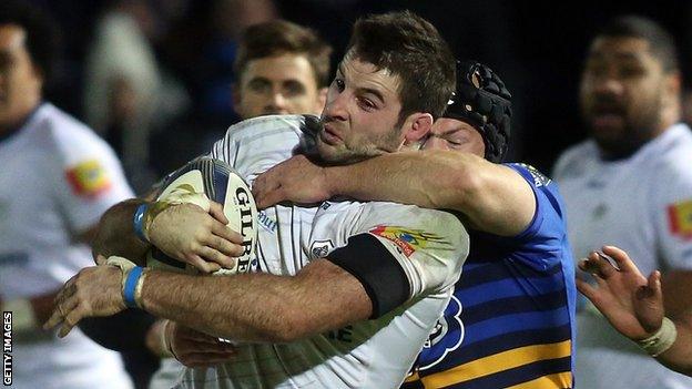 Johnnie Beattie is tackled during Castres' defeat by Harlequins