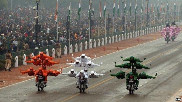 Indian Border Security Force (BSF) motorcycle specialists perform during the Republic Day parade