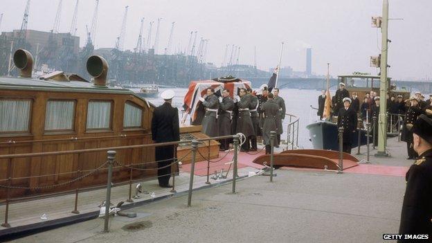 Churchill's coffin on board the Havengore at Tower Pier after the state funeral at St Paul's cathedral