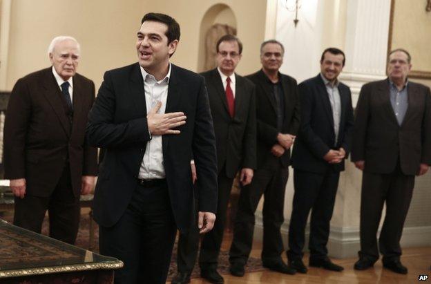 Alexis Tsipras smiles after being sworn in as prime minister of Greece, 26 January