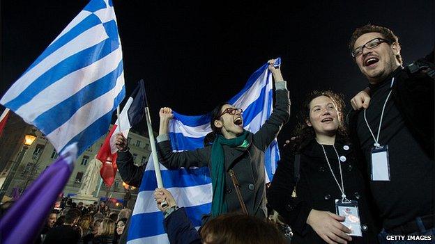 Syriza supporters cheer after the Greek election on January 25, 2015 in Athens