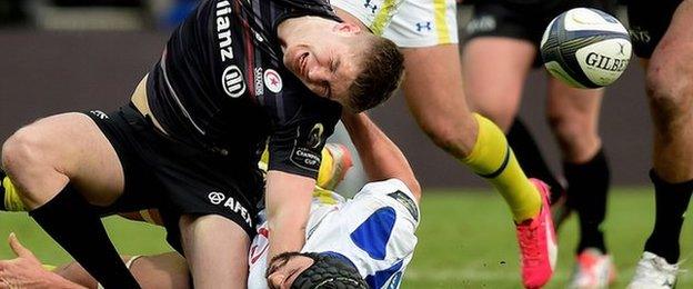 Owen Farrell is injured in a tackle by Clermont's Portugal flanker Julien Bardy