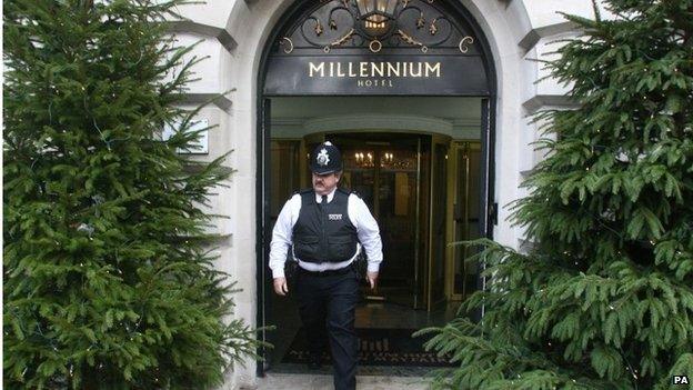 Police officer outside the Millennium Hotel