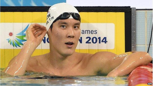 In a file photo taken on 26 September 2014 South Korea's Park Tae-hwan looks down the pool at the end of the fast heat (final 2) of the men's 1500m freestyle swimming event during the 17th Asian Games at the Munhak Park Tae-hwan Aquatics Centre in Incheon.