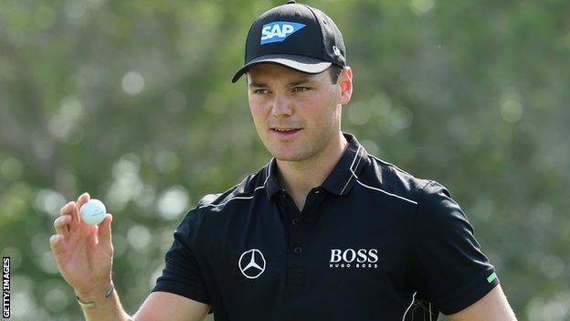 Martin Kaymer of Germany waves to the crowd during the third round of the Abu Dhabi Championship