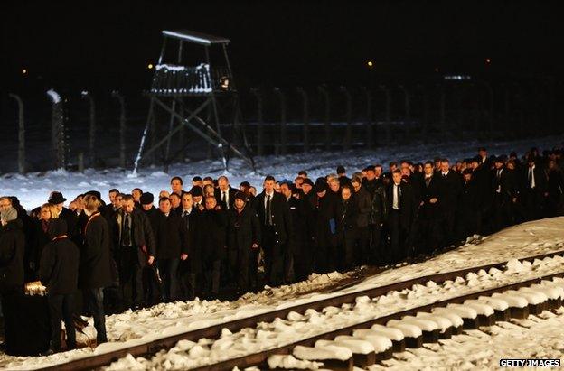 Delegations make their way to lay candles at the Birkenau Memorial, 27 January