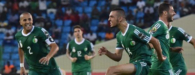 Nabil Bentaleb (second right) shows his delight after scoring Algeria's second goal