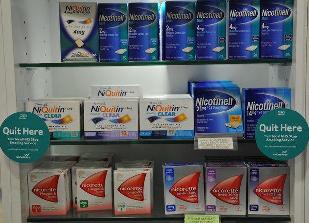 Shelves filled with smoking cessation products