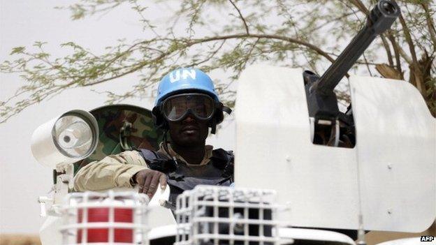 United Nations soldiers patrol on 27 July 2013 in the northern Malian city of Kidal