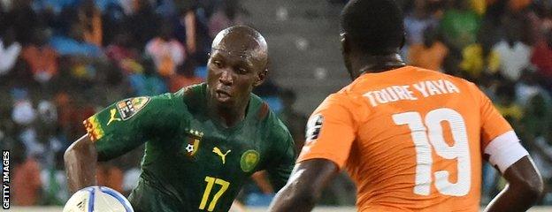 Cameroon's Stephane Mbia and Yaya Toure of Ivory Coast