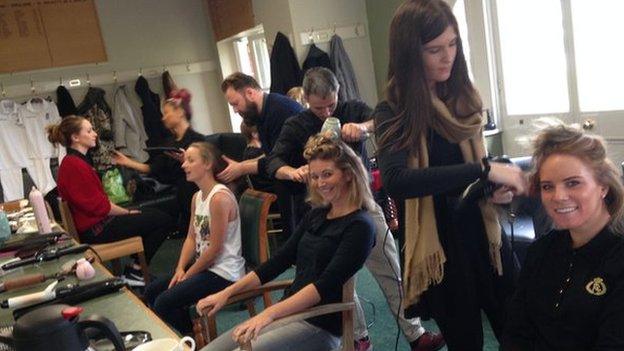 England's women get their hair done in the home dressing-room at Lord's