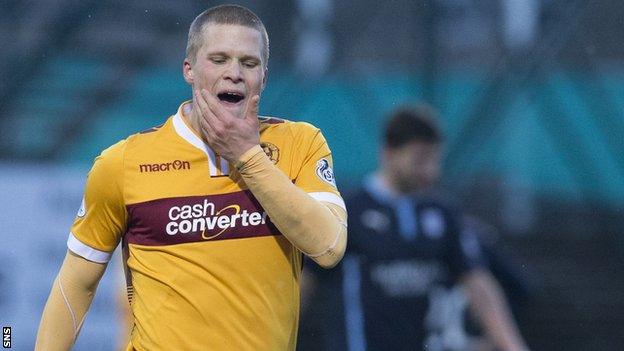 Henrik Ojamaa in action for Motherwell