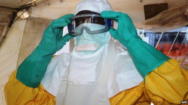 Member of MSF at isolation ward in Conakry, Guinea. 29 June 2014