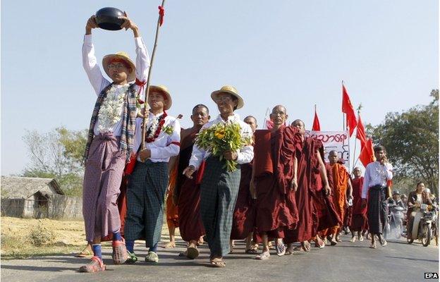 Student activists and Buddhist monks take part during the protest march demanding an amendment to the National Education Bill near Taung Tha township, Mandalay division, Myanmar, 28 January 2015.