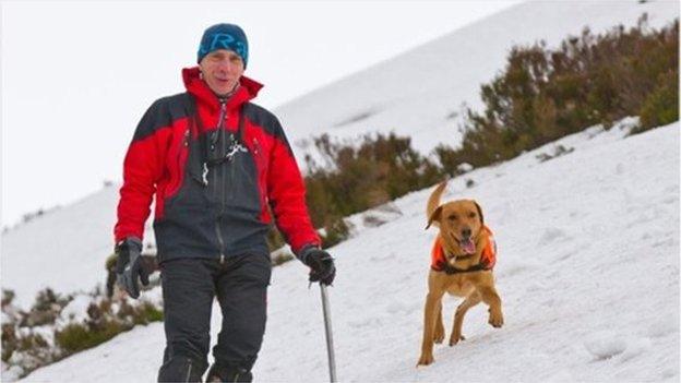 John Romanes and Rauour the dog