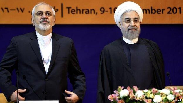 Iranian Foreign Minister Mohammad Javad Zarif and President Hassan Rouhani in Tehran (9 December 2014)