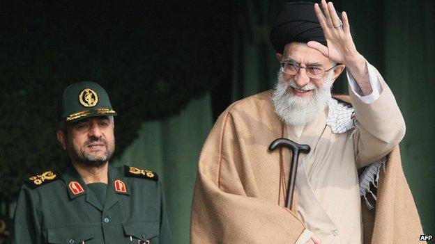 Iran's Supreme Leader Ayatollah Ali Khamenei (R) waves while standing next to Guards' commander-in-chief Gen Mohammad Ali Jafari in Tehran (26 November 2007)