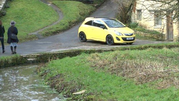 Yellow car in Bibury