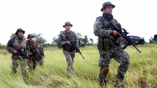 Members of the joint task forces patrol near Concepcion, Paraguay after the deaths of two German ranchers Jan 29 2015