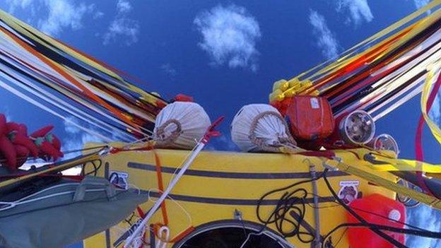 A view of the gas balloon's sandbags from the top of the capsule