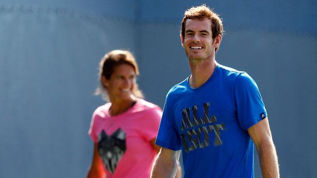 Amelie Mauresmo with Andy Murray in training.