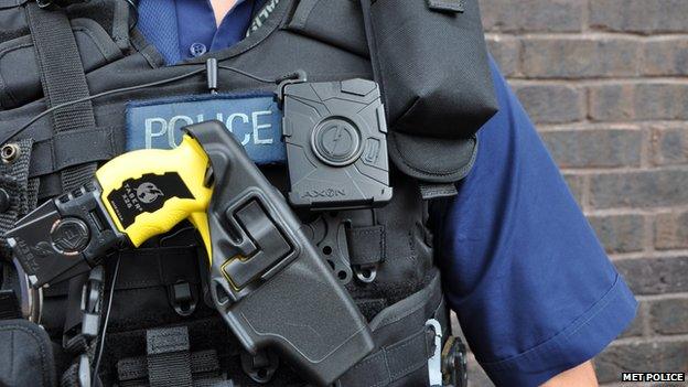 Police officer with a Taser