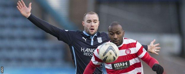 James McPake challenges Accies' Jason Scotland