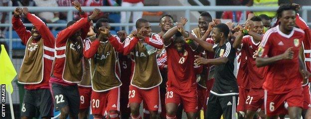 Thievy Bifouma (centre) is mobbed after scoring Congo's second but they could not hold the lead