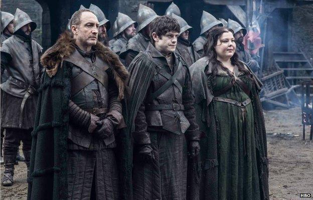 Michael McElhatton as Roose Bolton, Iwan Rheon as Ramsay Bolton and Elizabeth Webster as Walda Frey