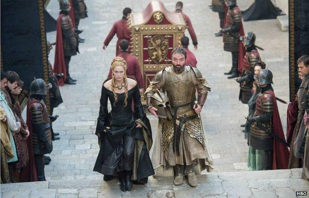 Lena Headey as Cersei Lannister and Ian Beattie as Meryn Trant