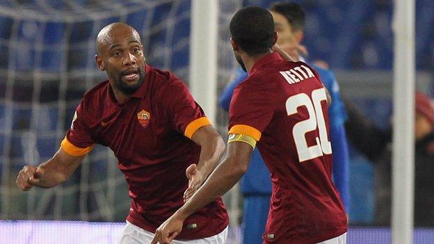 Maicon celebrates a goal for Roma