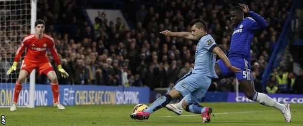 Chelsea's Kurt Zouma challenges Man City striker Sergio Aguero