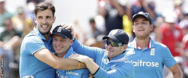 England celebrate the wicket of Mitchell Marsh