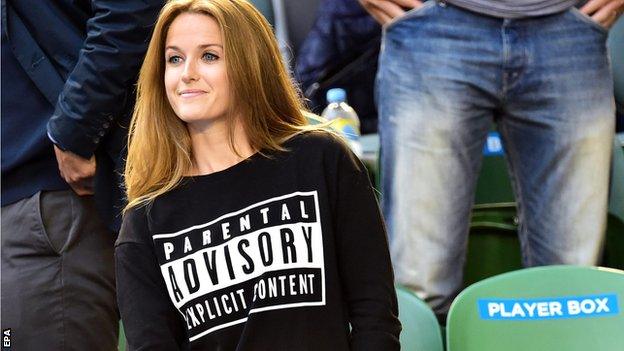 Kim Sears highlighted her sense of humour with a T-shirt at the Australian Open in Melbourne