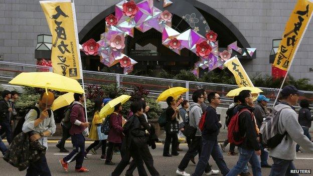 Protesters carrying banners which read People power during the march (01 February 2015)