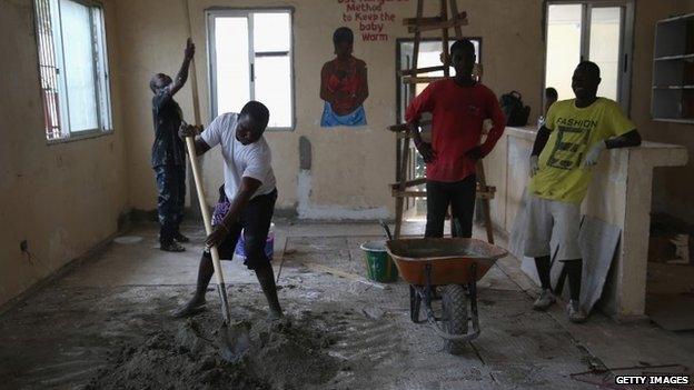 Workers renovate a paediatric ward which had been used as an Ebola holding centre at Redemption Hospital near Monrovia (29 January 2015)