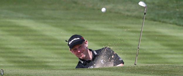 Stephen Gallacher plays a bunker shot in Sunday's final round in Dubai