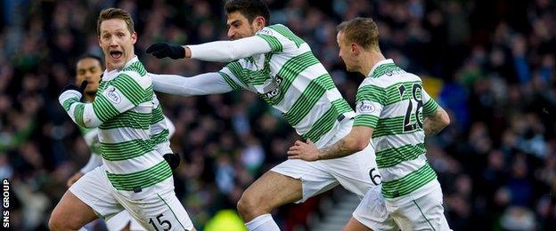 Kris Commons (left) celebrates making it 2-0 to Celtic after half an hour