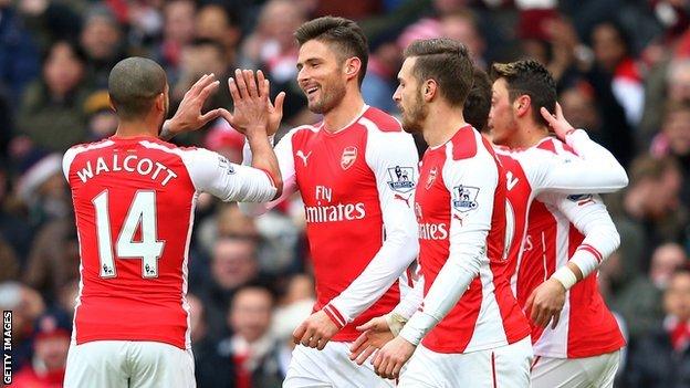 Olivier Giroud (centre) celebrates scoring Arsenal's opening goal