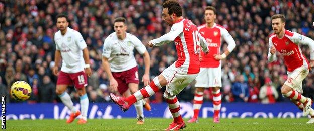 Santi Cazorla scores from the penalty spot