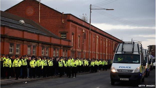 Police officers and vans