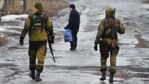 Pro-Russian rebels on patrol in Makiivka, a suburb of Donetsk (1 Feb)