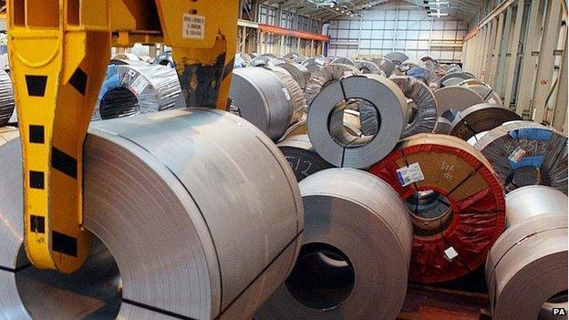 Rolls of steel being held in storage