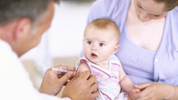 Baby having an injection